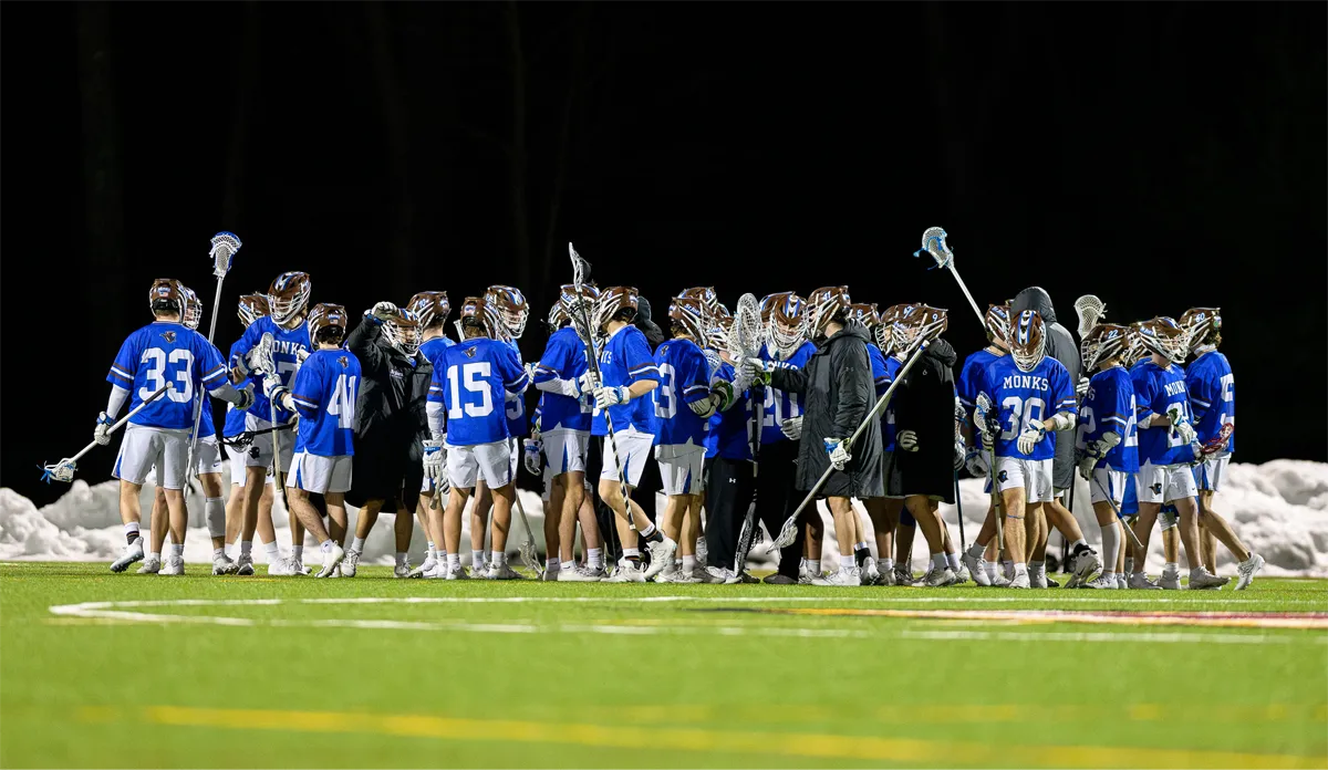 Monks Men's Lacrosse Team Huddle